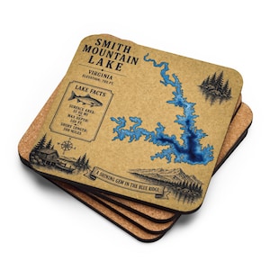 May include: A stack of square coasters with a map of Smith Mountain Lake, Virginia. The coasters have a brown background with blue lake details and text that reads "Smith Mountain Lake" and "A Shining Gem in the Blue Ridge."