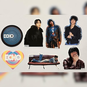 May include: A collection of stickers featuring images of people and the word "ECHO". The stickers include a circular design with blue and white concentric lines, a heart-shaped sticker, and several images of people in various poses.