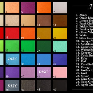 May include: A color chart of 49 felt squares with corresponding numbers and names. The felt colors include minty, ocean blue, lemon frost, peach chiffon, prickly purple, pumpkin spice, glitter white, white, silver gray, antique white, sandstone, cashmere tan, walnut brown, copper canyon, cocoa brown, ruby, red, coral red, orange, golden rod, gold, yellow, olive green, neon green, apple green, pirate green, kelly green, lagoon, peacock, aqua, baby blue, crystal blue, neon blue, brilliant blue, royal blue, cadet blue, navy blue, purple, orchid, bright lilac, violet sky, baby pink, shocking pink, candy pink, fuchsia, denim, smoke, charcoal gray, and black.