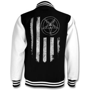 May include: A black and white varsity jacket with a white and black striped design on the back. The design features a pentagram with a goat's head inside.