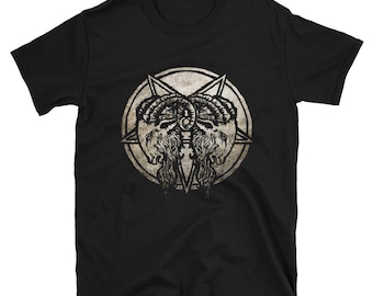 May include: Black t-shirt featuring a distressed graphic. The graphic includes a central circle with a star and a symmetrical design of ram heads. The design is in shades of gray and tan, creating a vintage look. The shirt is made of a soft material.