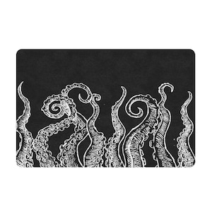 May include: Black and white illustration of an octopus with tentacles reaching up. The octopus is drawn in a vintage style on a black background.