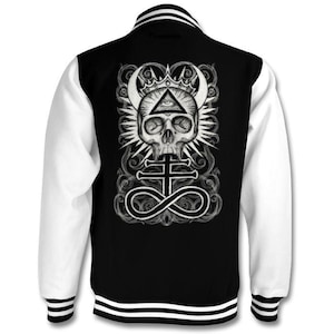 May include: Black and white varsity jacket with a skull and crossbones design. The skull has an all-seeing eye in its forehead and is surrounded by an infinity symbol.