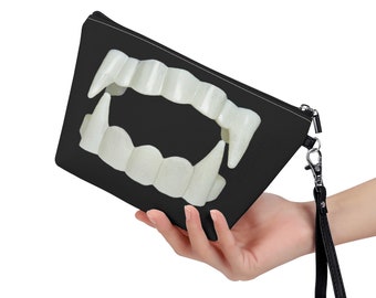 Borsa cosmetica con zanne di vampiro