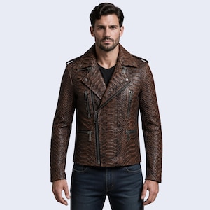 May include: A brown motorcycle jacket featuring a textured snakeskin pattern, a wide notched lapel, and an asymmetrical front zipper closure. The jacket includes multiple zippered pockets on the chest and waist, shoulder epaulets, and long sleeves.