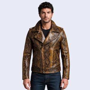 May include: A motorcycle jacket featuring a brown and black snakeskin pattern, a wide notched collar, long sleeves, and an asymmetrical front zipper closure. The jacket is worn over a plain black t-shirt and dark blue denim jeans.