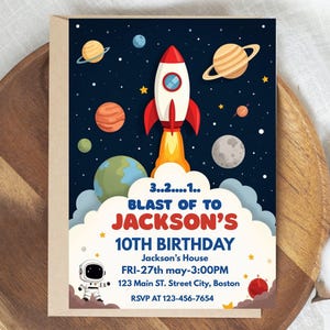 May include: A space-themed birthday invitation. It shows a red and white rocket launching amidst planets, stars, and an astronaut. The text reads "BLAST OFF TO JACKSON'S 10TH BIRTHDAY" with event details, set against a dark blue background.