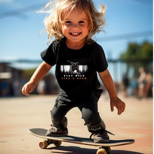 Stay Wild Like a Grom Toddler T-Shirt, Fun Short Sleeve Tee for Adventurous Kids, Perfect for Birthdays, Family Outings, Gifts