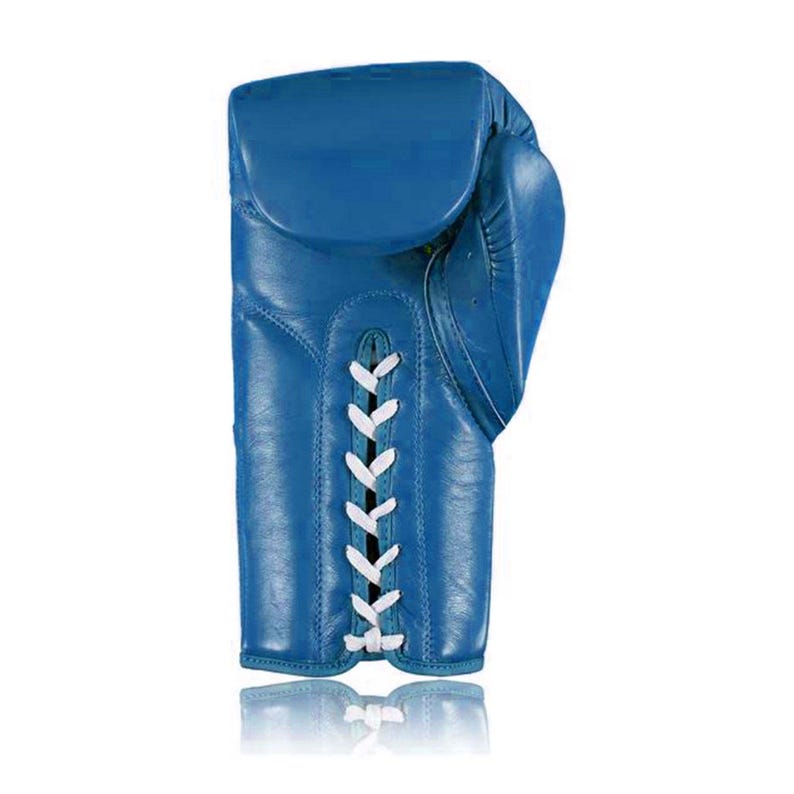 May include: A single, vibrant blue boxing glove. The glove is made of leather and features white laces down the center. The design is classic, with a padded area for impact and a secure wrist closure. The glove is shown against a white background.