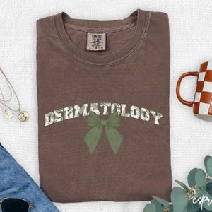 Cute Bow Dermatologist T-shirt, Dermatology Shirt, DERM Gift For Nurse, Nurse Appreciation Gift, Dermatology Tee, Derm Nurse T-Shirt, V060