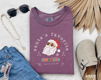 Swaddle Specialist Shirt, Christmas Nursery Nurse Tee, Nurse Life, NICU Nurse Shirt, Mother Baby Unit Shirt, Postpartum Nurse Shirt V179
