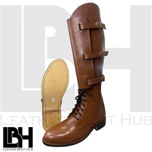 May include: A brown leather riding boot with a lace-up front and three buckle straps. The boot has a rounded toe and a tall shaft. The sole of the boot is visible next to the boot.