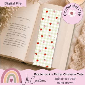May include: A rectangular bookmark featuring a green gingham design, decorated with red strawberries and white daisies. The bookmark measures approximately 5 cm by 15 cm. The text on the bookmark reads "Bookmark - Floral Gingham Cats".