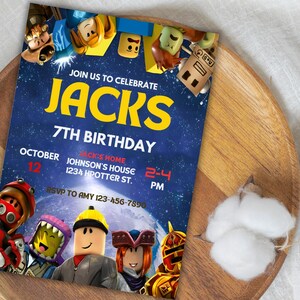 May include: A birthday party invitation with a blue background and yellow text that reads "JACKS 7TH BIRTHDAY." The invitation features cartoon characters and event details, including the date, time, and location.