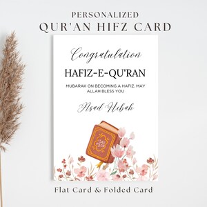 Puede incluir: Tarjeta Qur'an Hifz personalizada con el texto "Congratulation" y "HAFIZ-E-QU'RAN". La tarjeta incluye el mensaje "MUBARAK ON BECOMING A HAFIZ. MAY ALLAH BLESS YOU" y el nombre "Asad Hibah". La tarjeta presenta un diseño floral y una ilustración de un libro.