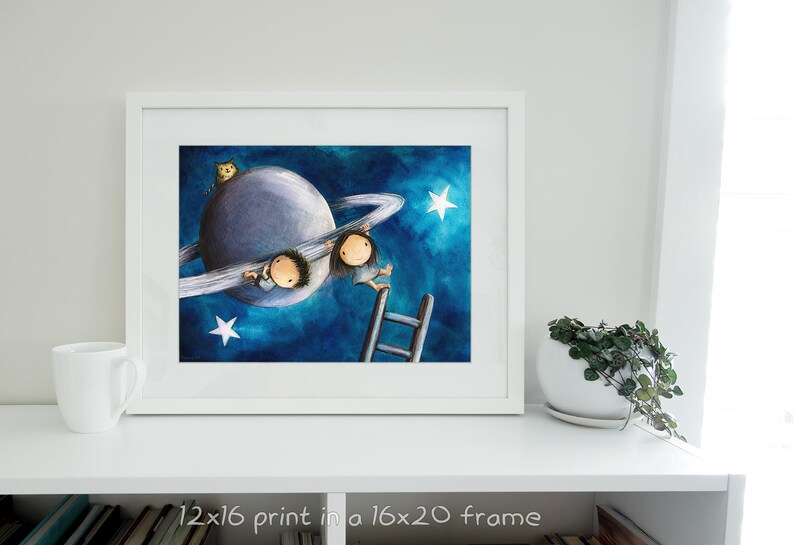 Hanging Out Astronomy art of a cute boy and girl on the planet Saturn. Cute couple kawaii wall décor. Chilling out in space with a cat 12 x 16 inches