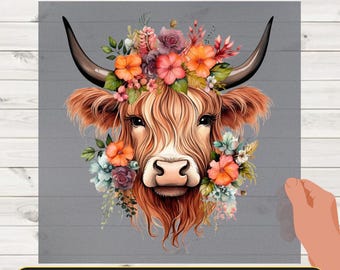 May include: DTF TRANSFER image with a watercolor illustration of a Highland cow head adorned with a floral crown. The cow has long, shaggy, reddish-brown fur, dark horns, and is surrounded by orange, pink, and blue flowers. The text "READY TO PRESS" is at the bottom.