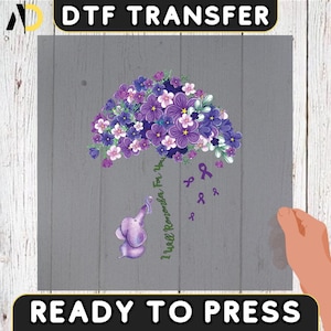 May include: Purple and white flower arrangement with an elephant and the text "I will remember you" in a gray background.  Ready to press DTF transfer.