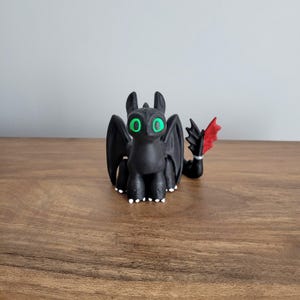 3D Printed Black Dragon Figurine: Fantasy Decor Collectible
