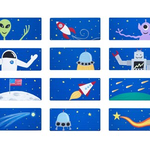 May include: Twelve illustrated tiles with a space theme. Each tile features a different space-related image, including an alien, astronaut, rocket, UFO, robot, shooting stars, and a comet.