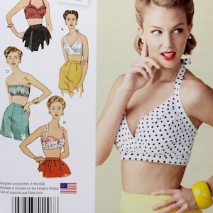 May include: Simplicity sewing pattern number 1426, a vintage 1950s style halter top sewing pattern. The pattern includes five different views of the halter top, with different necklines and straps. The pattern is designed for sizes US 4-12, European sizes 30-38, and French sizes 32-40.