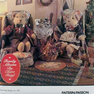 May include: A Simplicity Crafts pattern for making two teddy bear dolls. The pattern is titled "Family Albums by Elaine Heigl" and includes instructions for making a male and female teddy bear doll. The pattern is for one size.