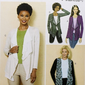 May include: A sewing pattern for a cardigan with a draped front. The pattern is for sizes X-Small, Small, and Medium. The pattern is from Butterick and has the number B6527 on it.