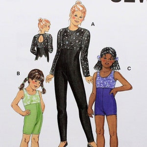 May include: Kwik Sew sewing pattern 2853 featuring illustrations of leotards and unitards. The pattern includes sizes 8-10-12-14. The cover shows three figures wearing different styles of dancewear. The pattern is designed by Kerstin Martensson.
