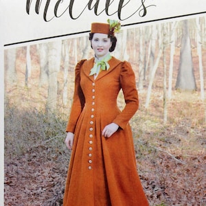 May include: McCall's sewing pattern M8123 for a long, orange coat with a button-up front and a high collar. The model is wearing a hat and a green bow tie. The pattern is for sizes 6-8-10-12-14. The text "Angela Clayton" is at the bottom of the pattern.