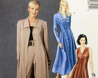May include: A sewing pattern for a long, flowing dress with a button-up front and a long, flowing coat. The pattern is for sizes AX (4, 6, 8) and is called McCall's 7264.