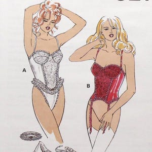 May include: A vintage sewing pattern titled "Pattern 2358" by Kwik Sew. The pattern features illustrations of a bodysuit and merry widow lingerie designs. Includes sizes XS-S-M-L and accessories like a bag, garter, and handkerchief.