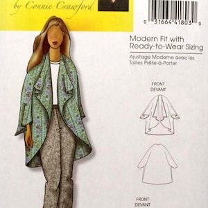 May include: A Butterick B5108 sewing pattern envelope by Connie Crawford featuring a modern fit with ready-to-wear sizing. The illustration shows a long-sleeved, open-front floral jacket worn over a white top and textured trousers with purple shoes.