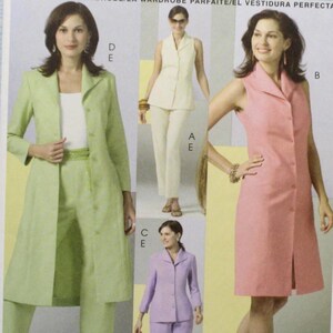 May include: McCall's Classic Fit sewing pattern M4877. The pattern features images of women's suits and dresses in various colors, including green, pink, and lavender. The pattern includes sizes BB (8-10-12-14).