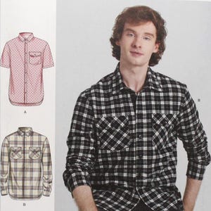 May include: Simplicity sewing pattern S3206 featuring shirt designs. The pattern includes illustrations of a short-sleeved shirt with a small print and a long-sleeved plaid shirt. The image also shows a person wearing a black and white plaid shirt.