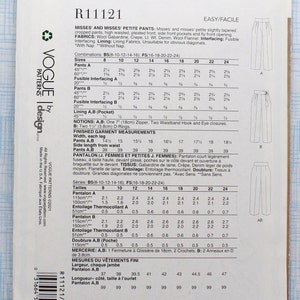 May include: Vogue sewing pattern R11121 for misses' and misses' petite trousers. The pattern includes instructions for making slightly tapered cropped trousers with a high waist, pleated front, side front pockets, and a fly front opening. The pattern is suitable for fabrics such as wool gabardine, crepe, lightweight denim, and wool flannel. The pattern includes a size chart for sizes 8-24.