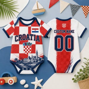 May include: Two baby bodysuits featuring a red and white checkered pattern. The front displays the text CROATIA, a small Croatian flag, a coat of arms, and a coastal city illustration. The back features the text CUSTOM NAME and the number 00.