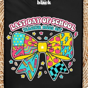 May include: Black t-shirt with a colorful bow design and the text "LAST DAY OF SCHOOL TEACHER MODE OFF". The bow features various patterns including stars, smiley faces, pencils, apples, and lightning bolts. The shirt is decorated with small star and lightning bolt graphics.