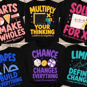 May include: Six black t-shirts featuring colourful maths-themed graphics and text. Designs include fractions with pizza, multiplication grids, algebra equations, geometry tools, probability dice, and calculus symbols with bright, bold typography.