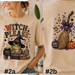 May include: A sand-colored t-shirt featuring a graphic of a frog wearing a witch hat, a cauldron, and potion bottles with the text Witch Please on the front, and a broomstick with a purple bow and pumpkins on the back.