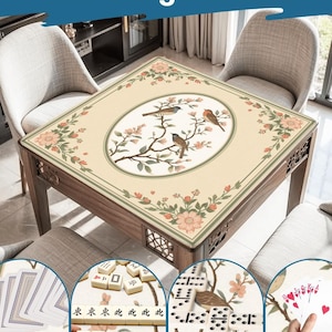 May include: A wooden game table with a beige floral and bird design. The table has a square top with an oval centerpiece featuring birds on branches. The image includes the text "Wide Range of Uses".