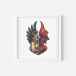 May include: Framed artwork featuring a pixelated illustration of an angel and a devil. The angel has green wings and a gold halo, while the devil has red horns and wings. The artwork is in a white frame.