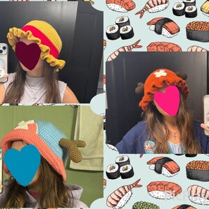 May include: Three crochet bucket hats featuring character-inspired designs. One hat is yellow with a red band and ruffled brim. Another is orange with brown antlers and a white cross. The third is light blue and orange with brown antlers.