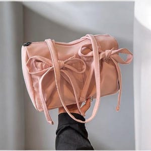 2025 neue koreanische Bogen-Nylon-Umhängetasche - Modische & süße Design-Tote, gefaltete Pendler-Frauenhandtasche mit großer Kapazität