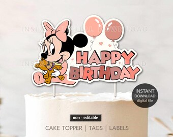 May include: A cake topper featuring Minnie Mouse holding a teddy bear, with the words "HAPPY BIRTHDAY" in pink. Two pink balloons and hearts are also included in the design. The words "CAKE TOPPER | TAGS | LABELS" are printed at the bottom.