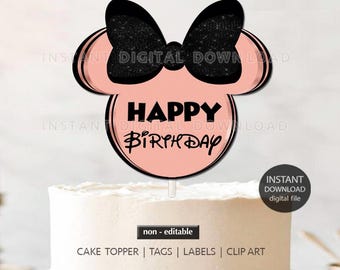May include: Pink and black cake topper featuring a silhouette of a mouse head with a bow. The text "Happy Birthday" is written in a black circle on the topper.