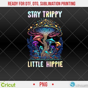 May include: A colorful graphic featuring a large mushroom with a blue and yellow cap and smaller mushrooms in various colors. The text "STAY TRIPPY LITTLE HIPPIE" is displayed in a rainbow font. The background is black with a diamond pattern.