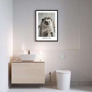 May include: A framed black and white photograph of a hedgehog with the text "Bad Hair Day" printed below the image.