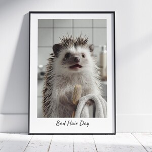 May include: A hedgehog with a surprised expression holds a hairbrush in a bathroom setting. The text "Bad Hair Day" is printed below the image.