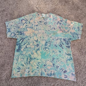 Size 2 XL, green, blue, tan, aqua, Bleach dye T dye shirt with scrunch pattern.