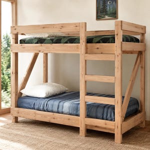 May include: A light-colored wooden bunk bed with a ladder and angled support beams. The top bunk has a green and black patterned comforter, while the bottom bunk has a blue striped comforter. A white pillow rests on the bottom bunk.